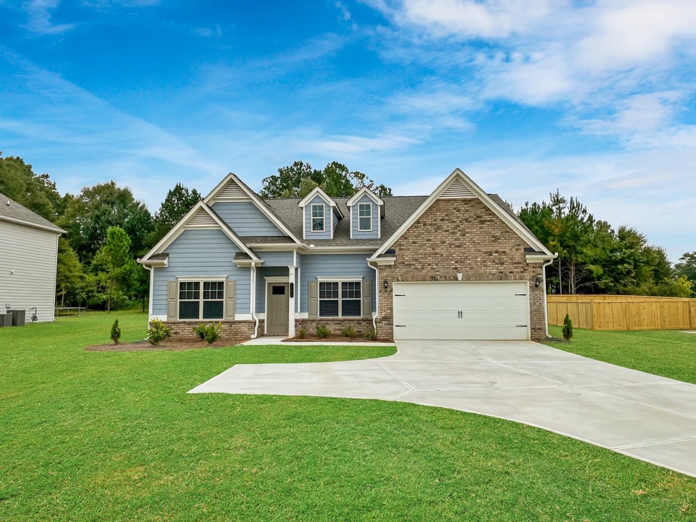 An exterior photo of the Raleigh home builder: Smith Douglas and their “Avery” model.